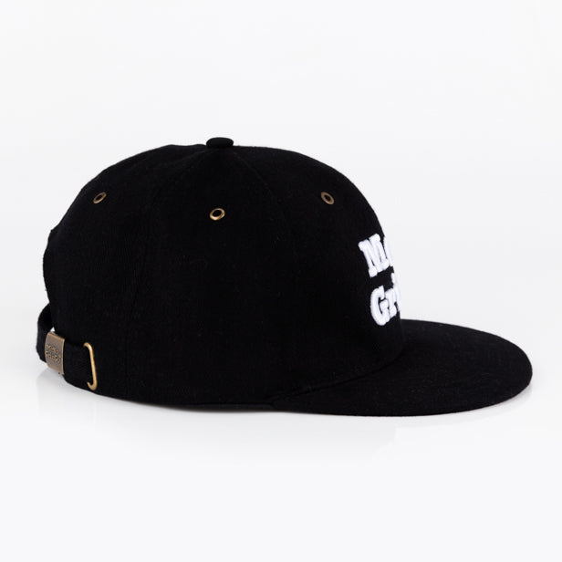 Black Flat peaked cap. 100% cotton.